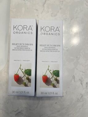 KORA Organics Silky Sun Drops SPF 30 - White with Red Accent - New, unopened